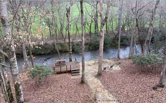a backyard of a house with lots of green space