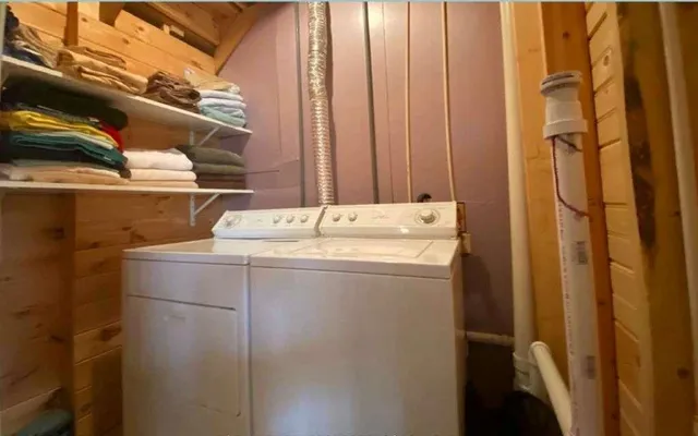 a utility room with dryer and washer
