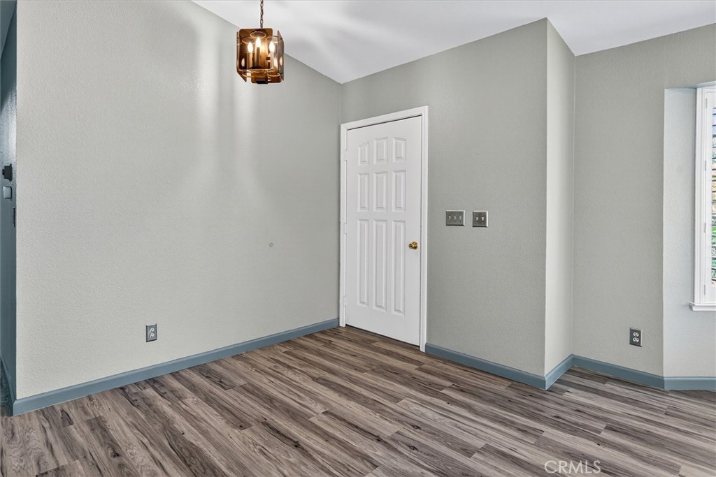 3310 Deer Run Road Mariposa, CA 95338 - Photo 19 of 47 a view of a room with wooden floor