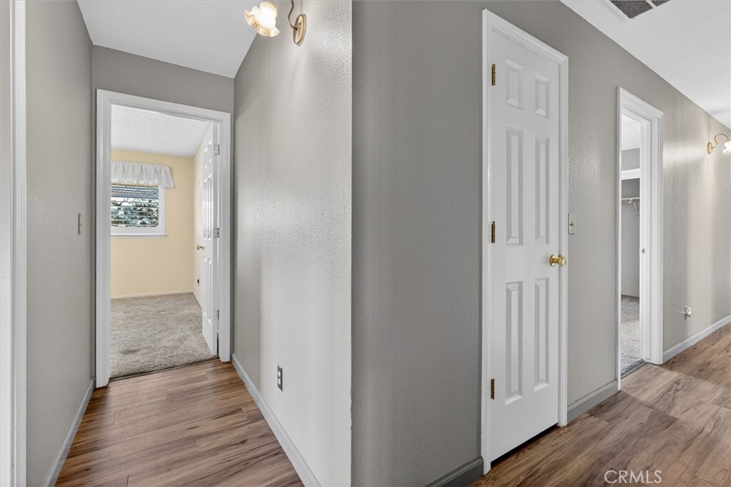 3310 Deer Run Road Mariposa, CA 95338 - Photo 20 of 47 a view of a hallway with wooden floor