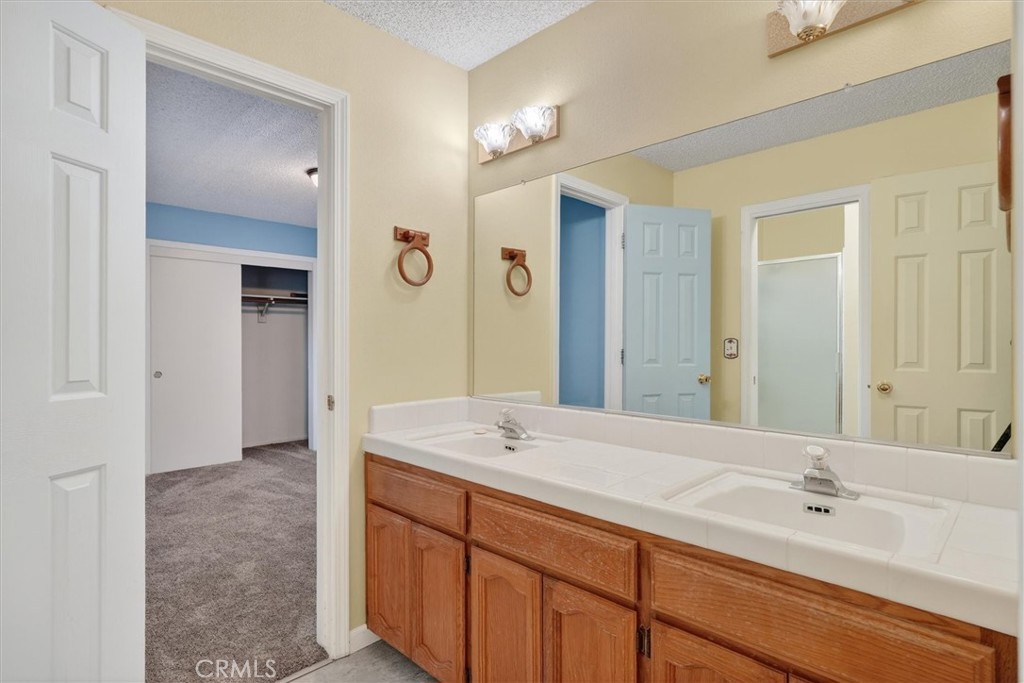 3310 Deer Run Road Mariposa, CA 95338 - Photo 24 of 47 a bathroom with a sink and a mirror