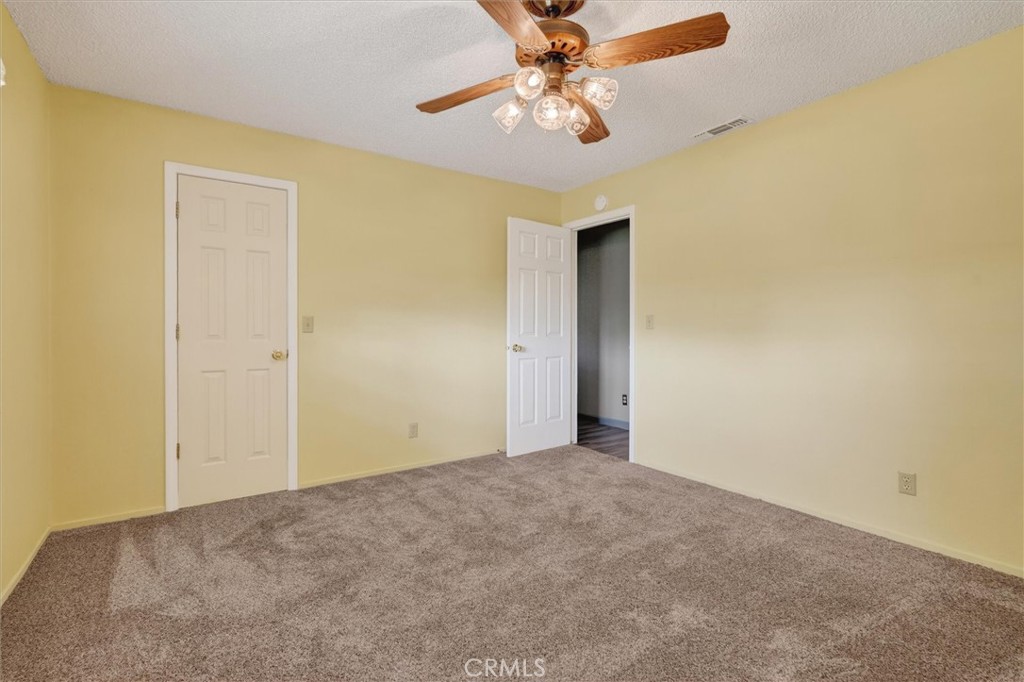 3310 Deer Run Road Mariposa, CA 95338 - Photo 29 of 47 a view of an empty room and a ceiling fan