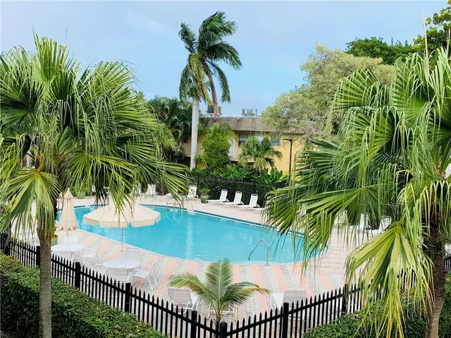 a view of outdoor space yard and swimming pool