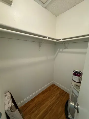 a view of a room with racks on the wall