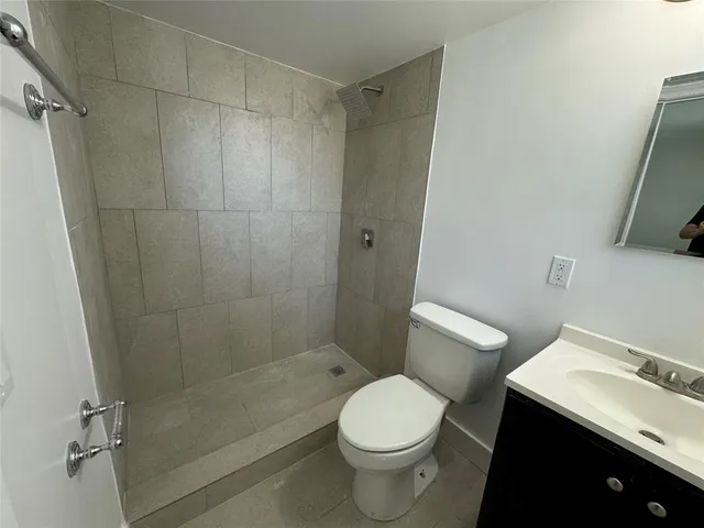 a bathroom with a sink and a toilet