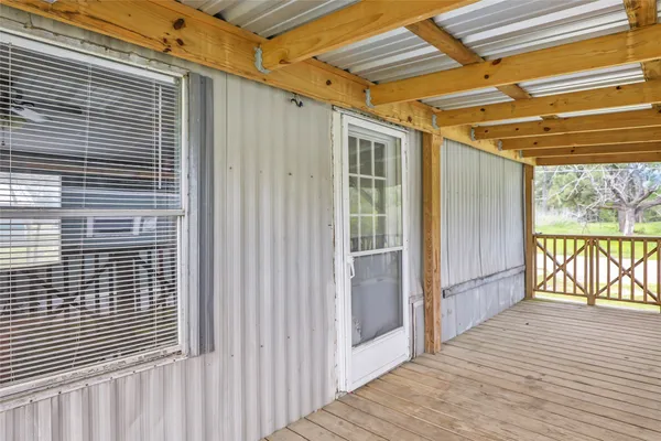 a view of a balcony with a door
