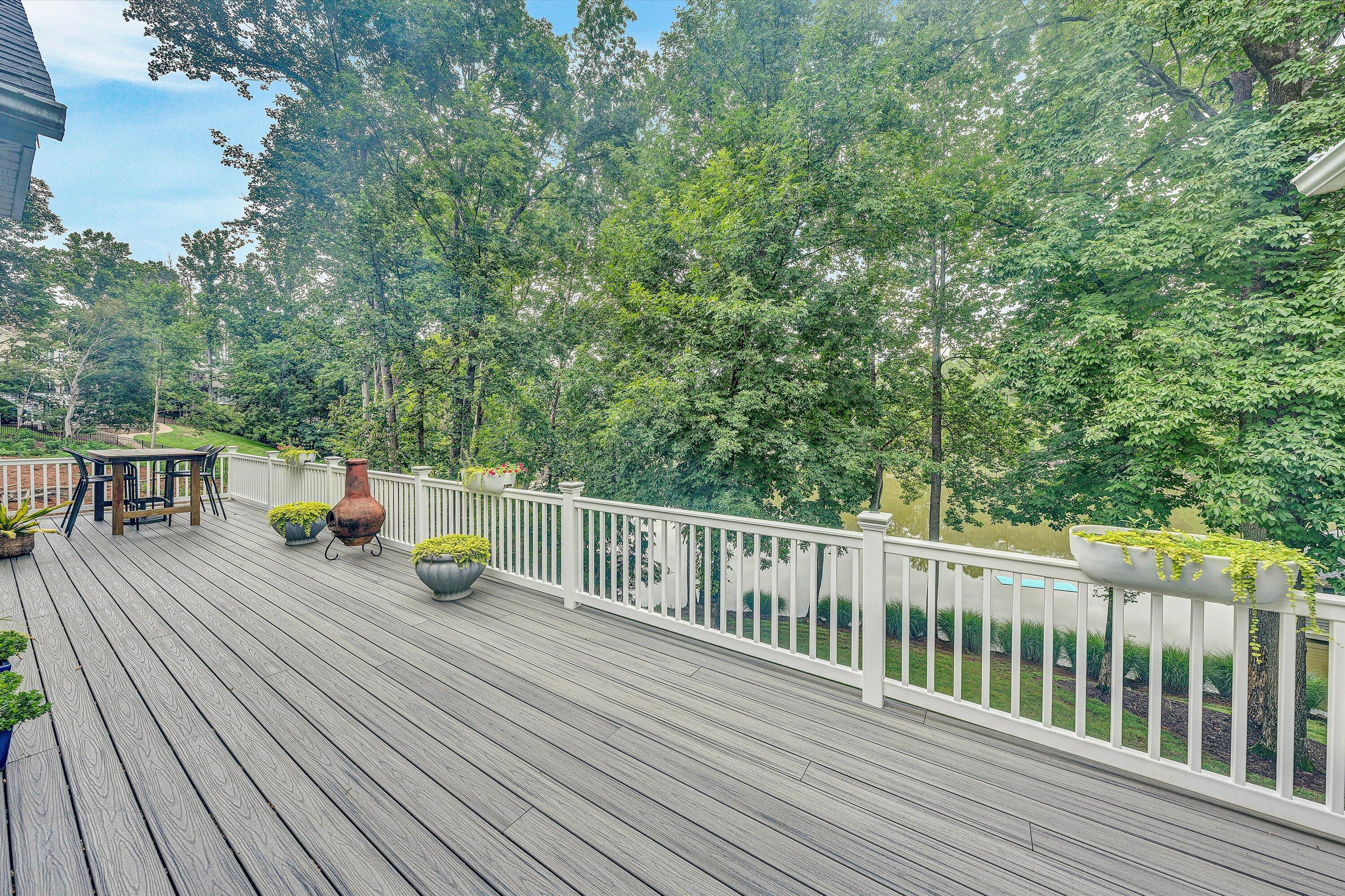 239 Cedar Bay Road Union Hall, VA 24176 - Photo 13 of 51 a view of a balcony with wooden floor and seating space