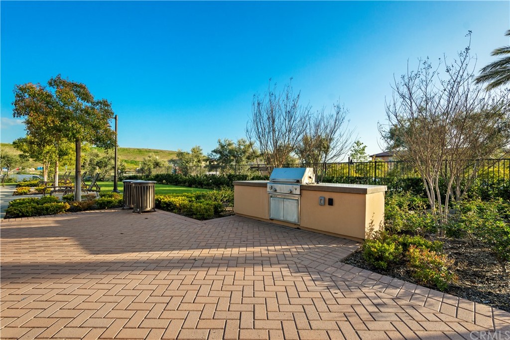 109 Hemisphere Irvine, CA 92618 - Photo 8 of 10 a view of a terrace with a garden