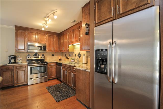 881 General George Patton Road, Unit 881 Nashville, TN 37221 - Photo 3 of 20 Fantastic cabinets, SS appliances, and beautiful quartz countertops