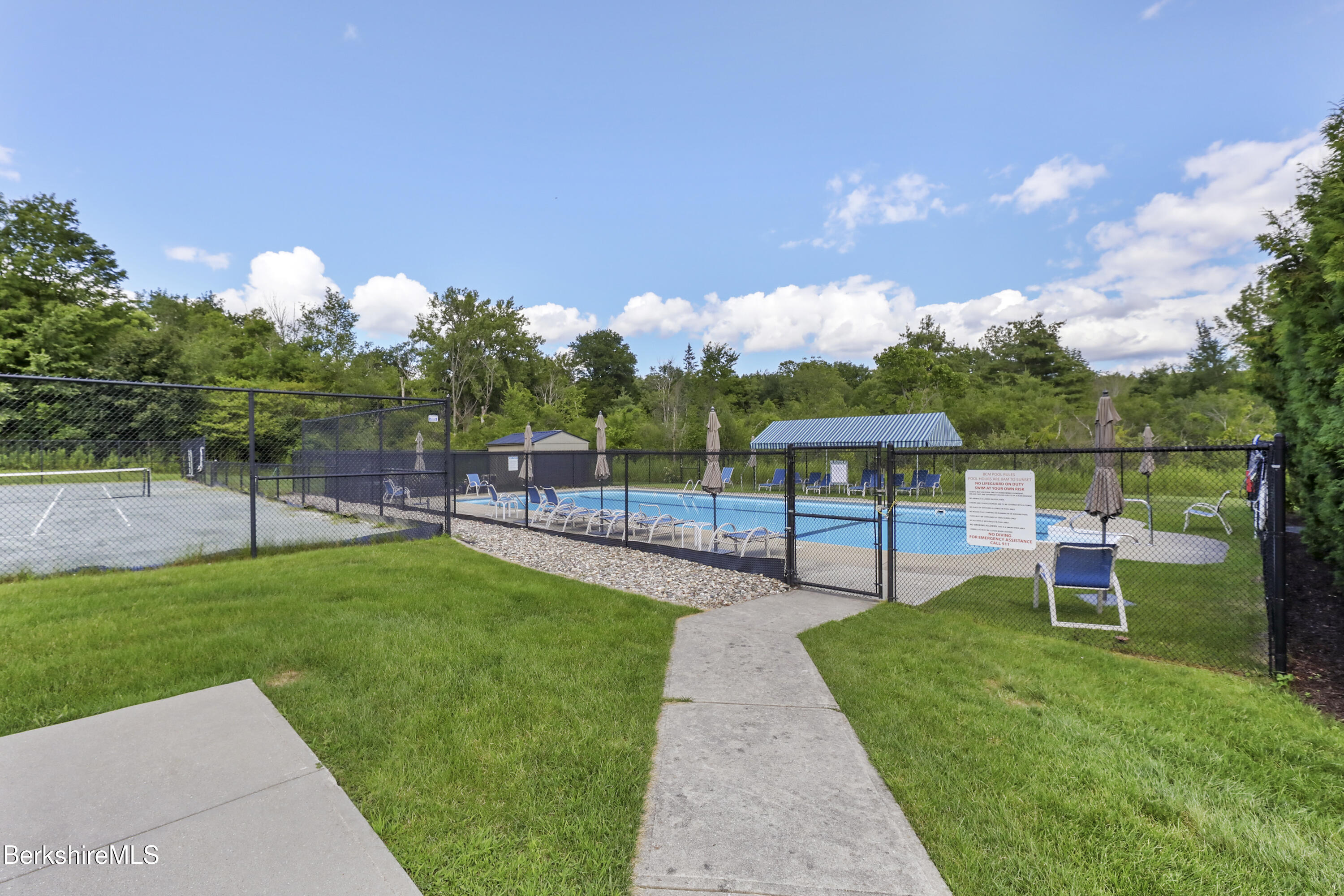 5 Aspen Way Pittsfield, MA 01201 - Photo 17 of 19 a view of a park with sitting area