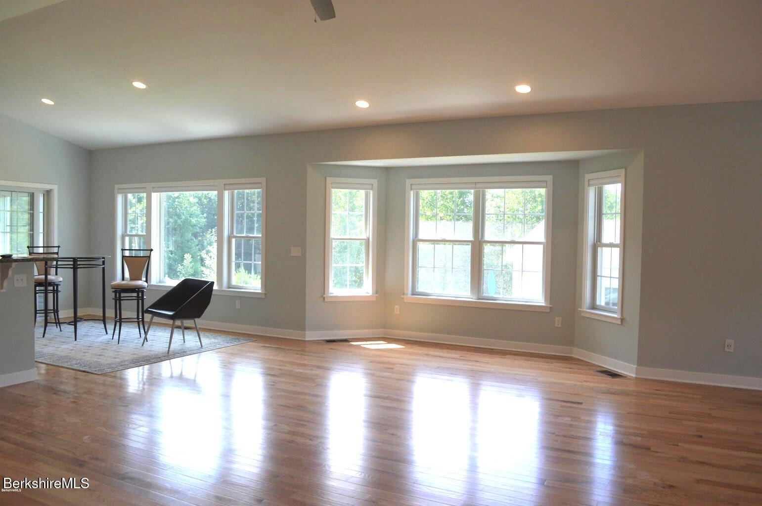 5 Aspen Way Pittsfield, MA 01201 - Photo 7 of 19 a living room with furniture and a large window