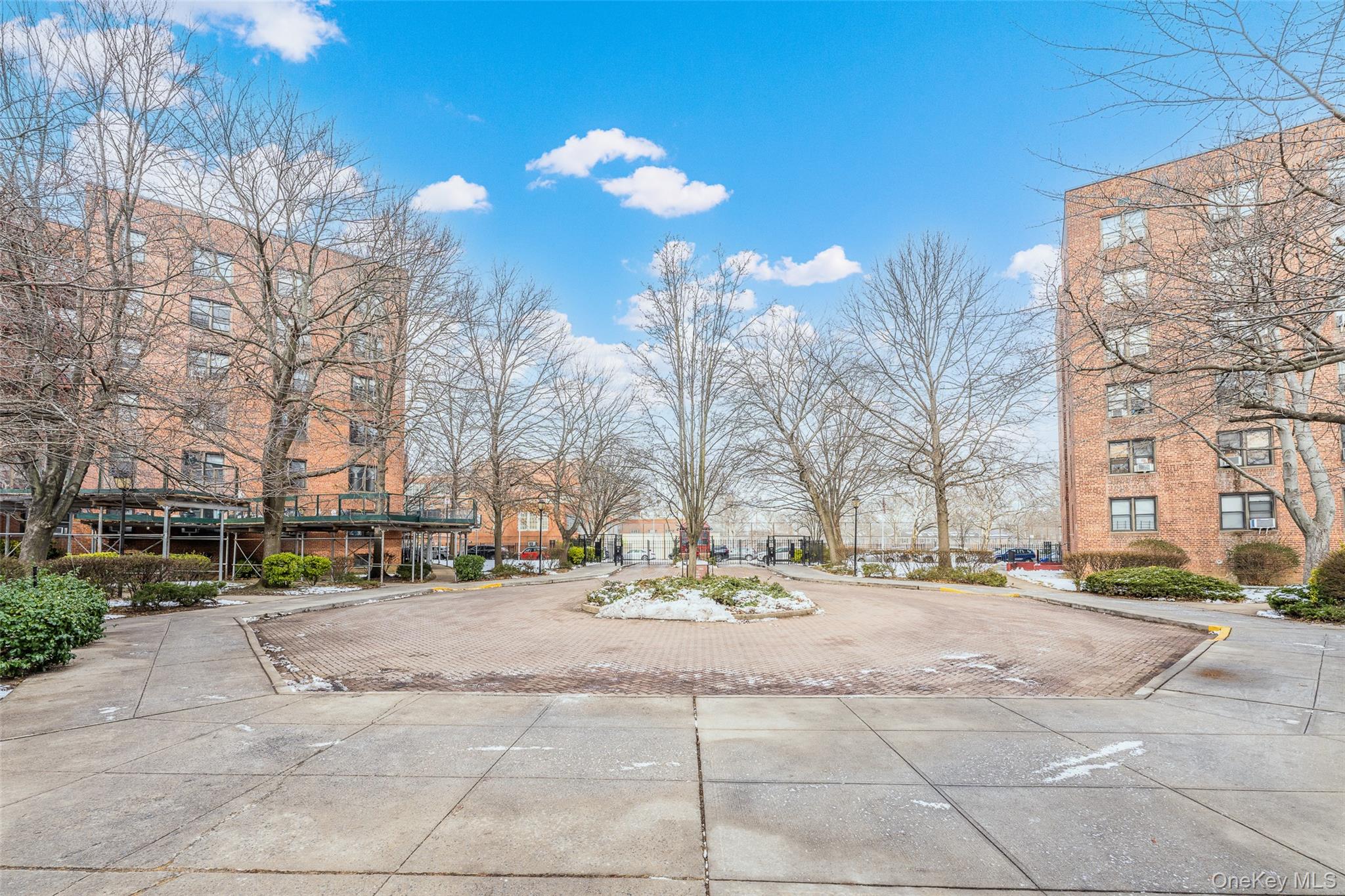 150-15 72nd Road, Unit 5G Queens, NY 11367 - Photo 21 of 27 a view of city street with tall buildings