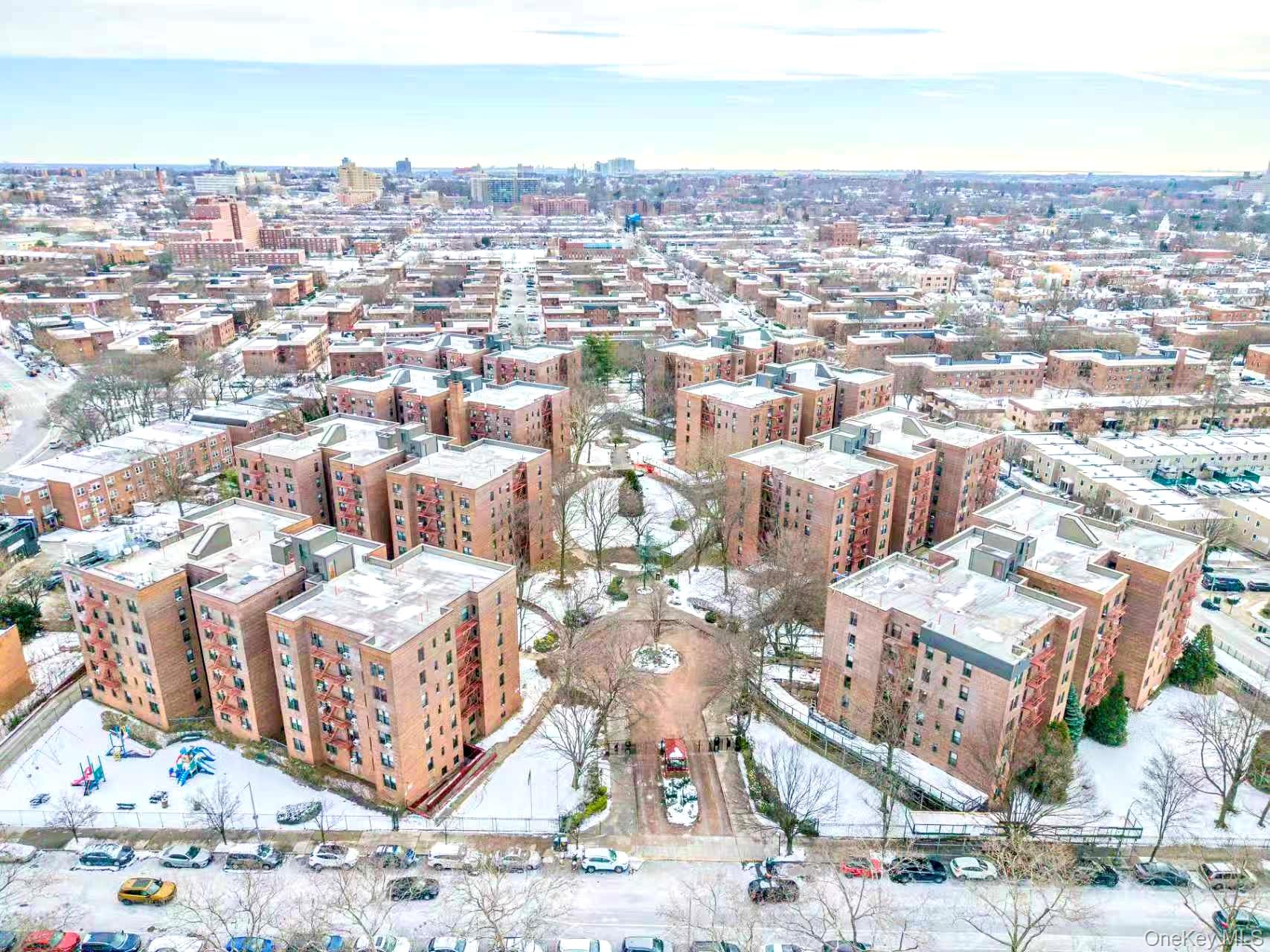 150-15 72nd Road, Unit 5G Queens, NY 11367 - Photo 25 of 27 an aerial view of residential houses with yard