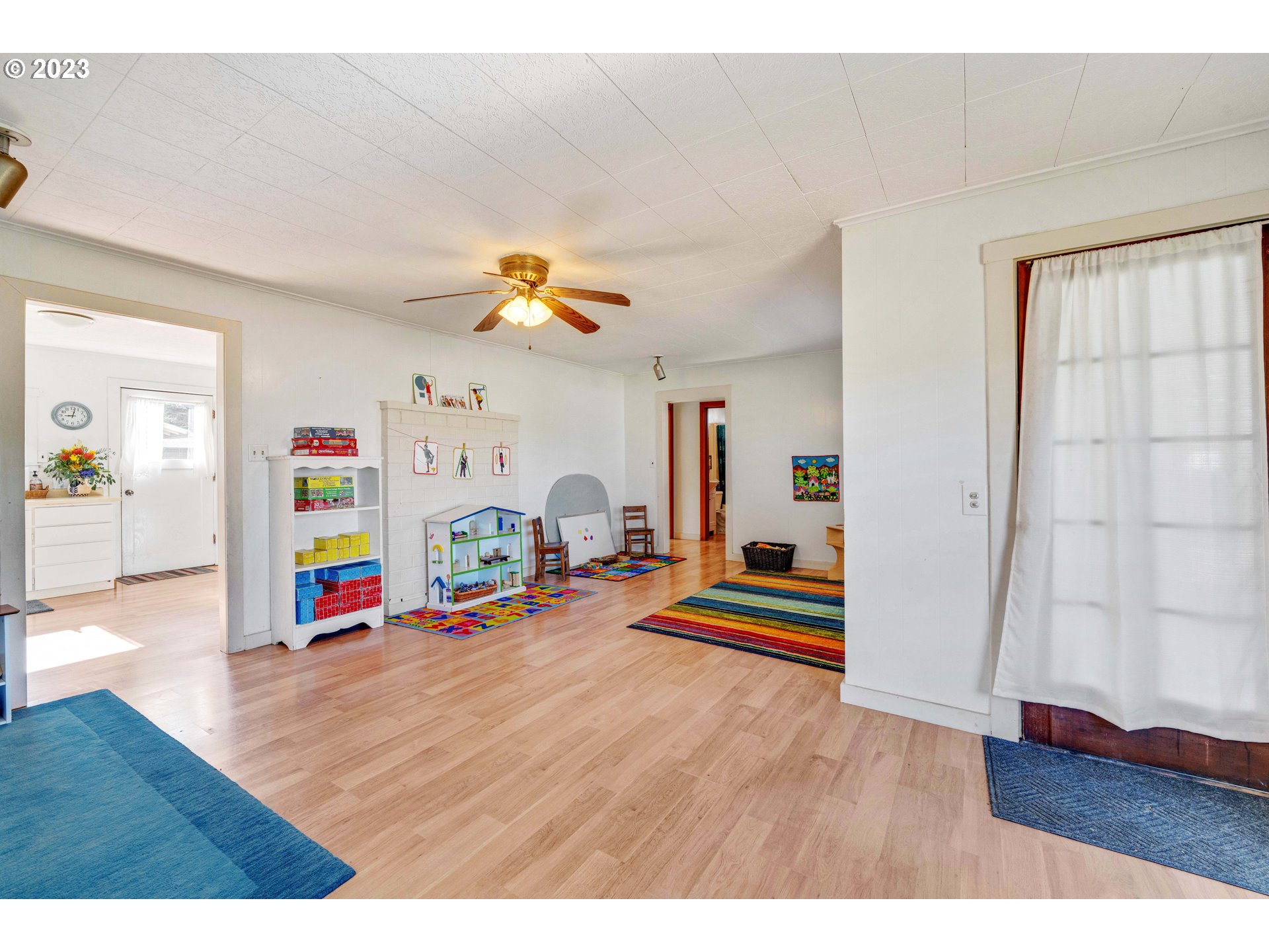 535 Edison Avenue Southwest Bandon, OR 97411 - Photo 8 of 33 a view of empty room with wooden floor