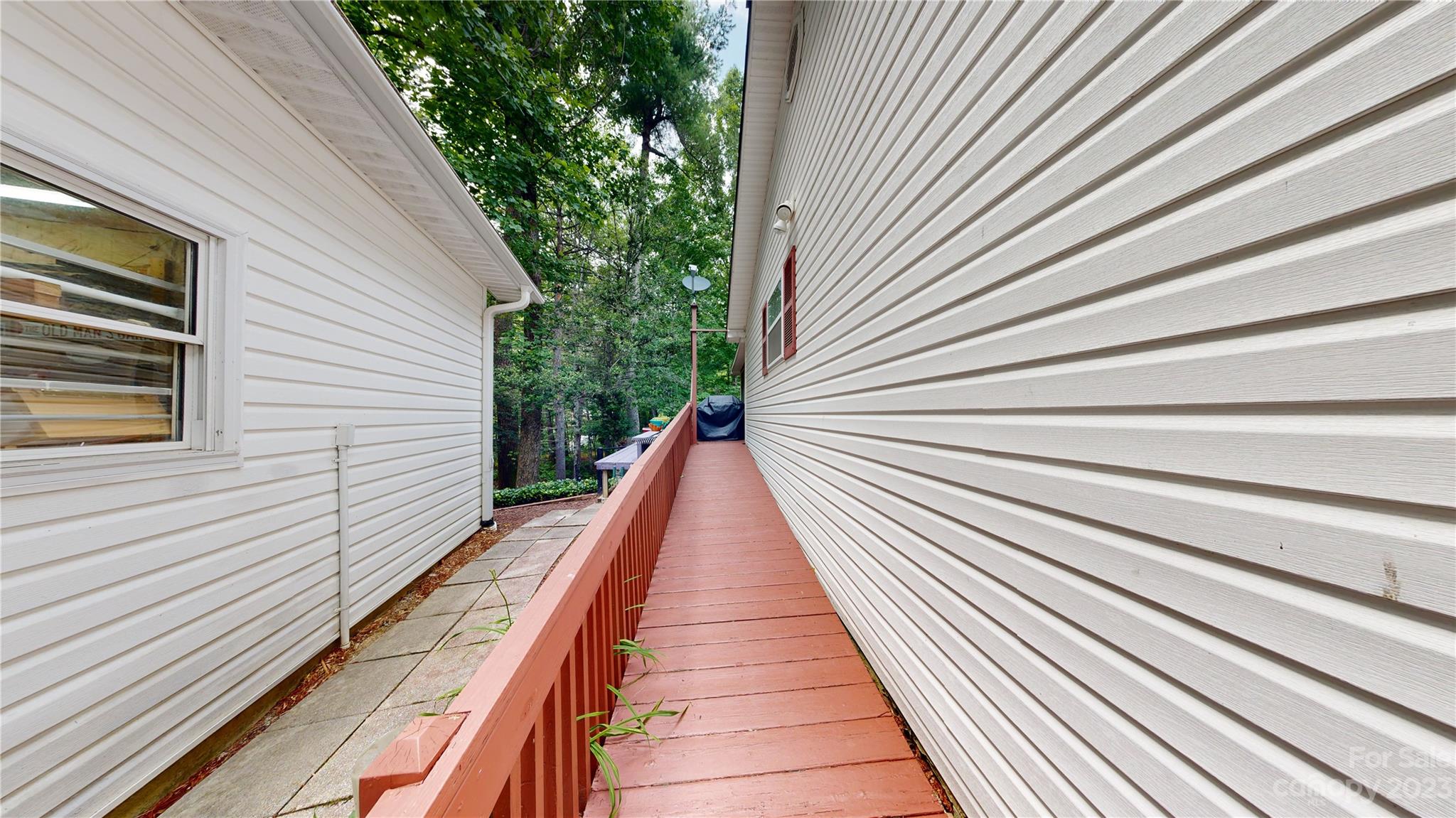 4211 Staton Road Hendersonville, NC 28739 - Photo 30 of 43 a view of balcony with wooden floor and stairs