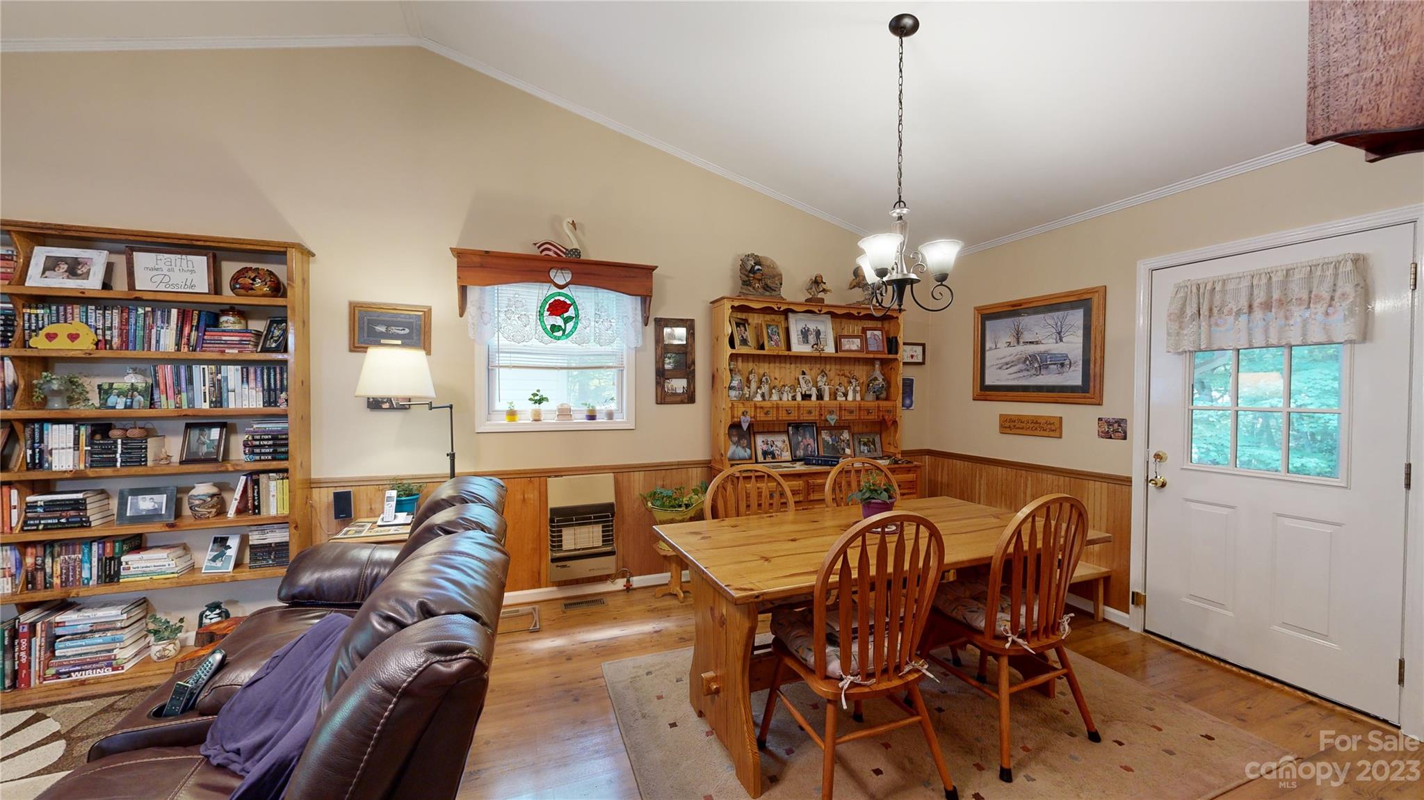 4211 Staton Road Hendersonville, NC 28739 - Photo 36 of 43 a view of a dining room with furniture window and wooden floor