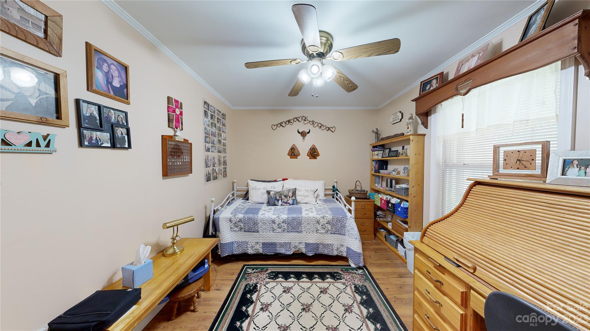 4211 Staton Road Hendersonville, NC 28739 - Photo 37 of 43 a bedroom with bed and furniture