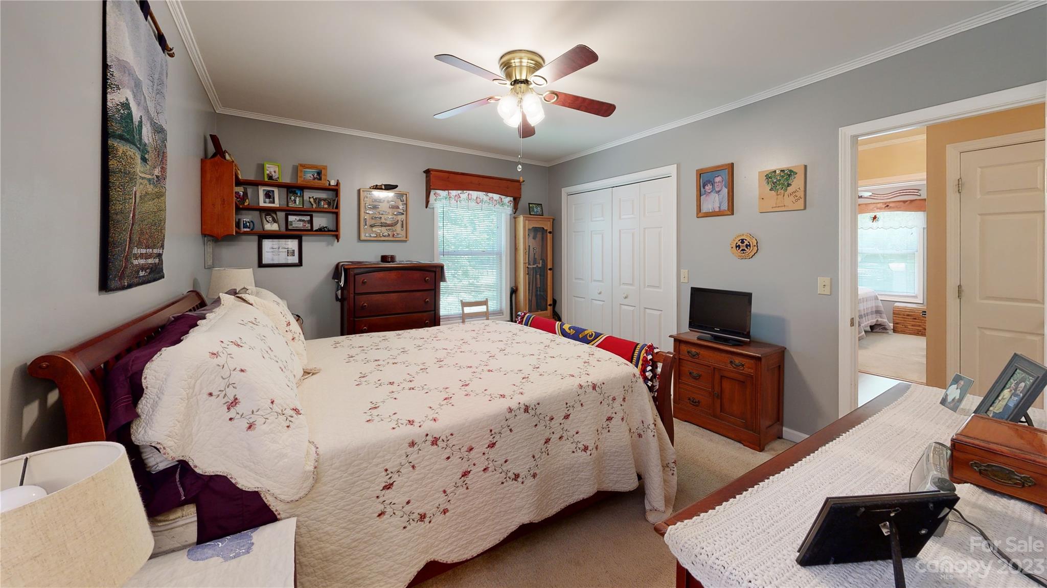 4211 Staton Road Hendersonville, NC 28739 - Photo 41 of 43 a bedroom with a bed and a flat screen tv