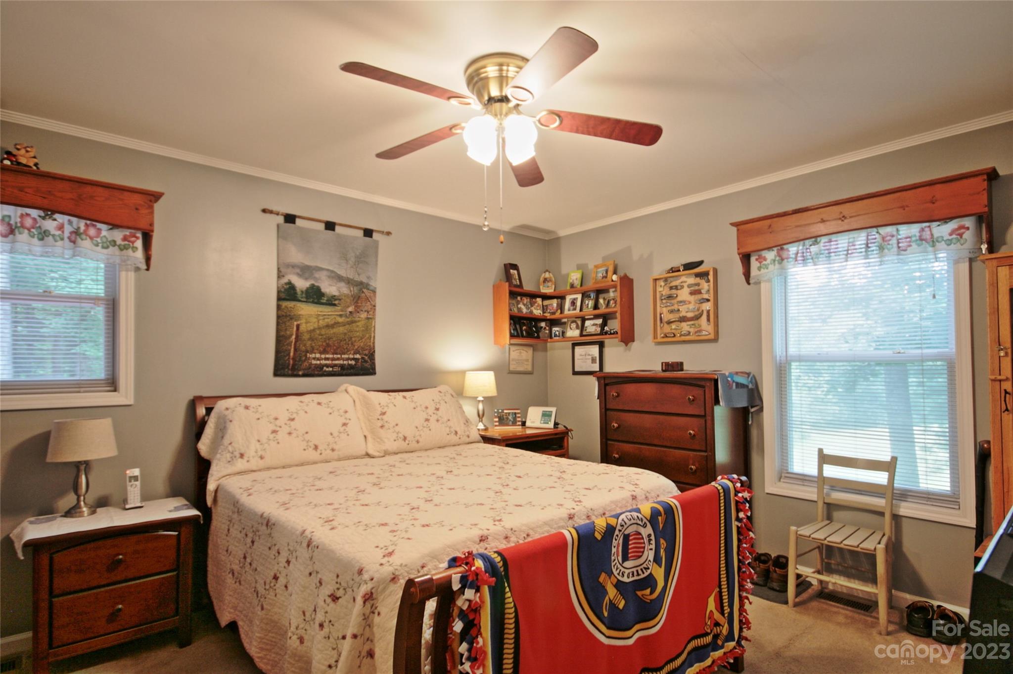 4211 Staton Road Hendersonville, NC 28739 - Photo 9 of 43 a bedroom with a bed and wooden floor