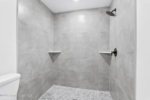 wooden floor in an empty room and a window