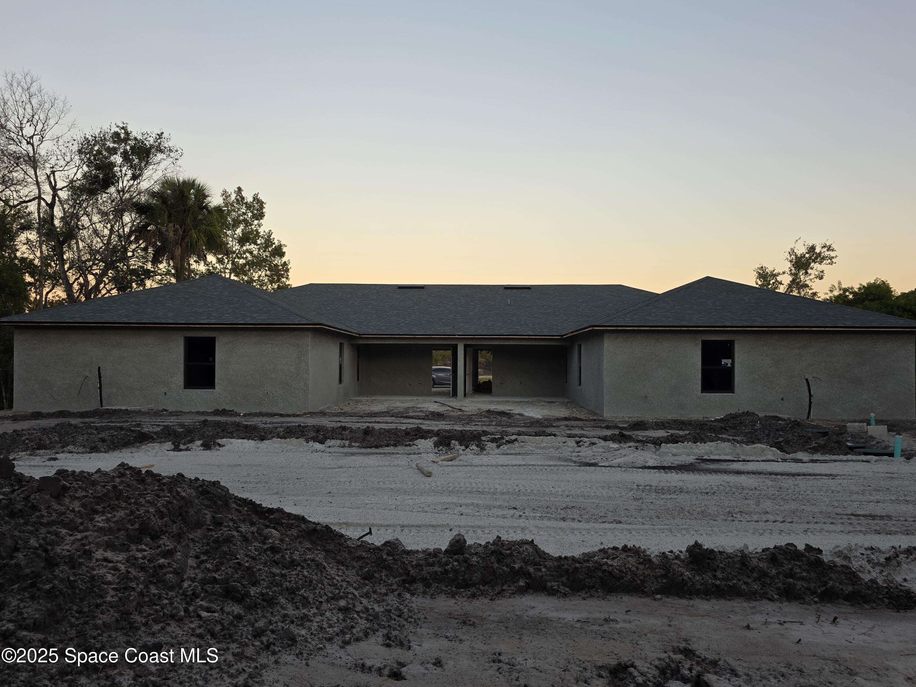2542 Hester Avenue Southeast, Unit A Palm Bay, FL 32909 - Photo 4 of 9 a backyard of a house with lots of green space