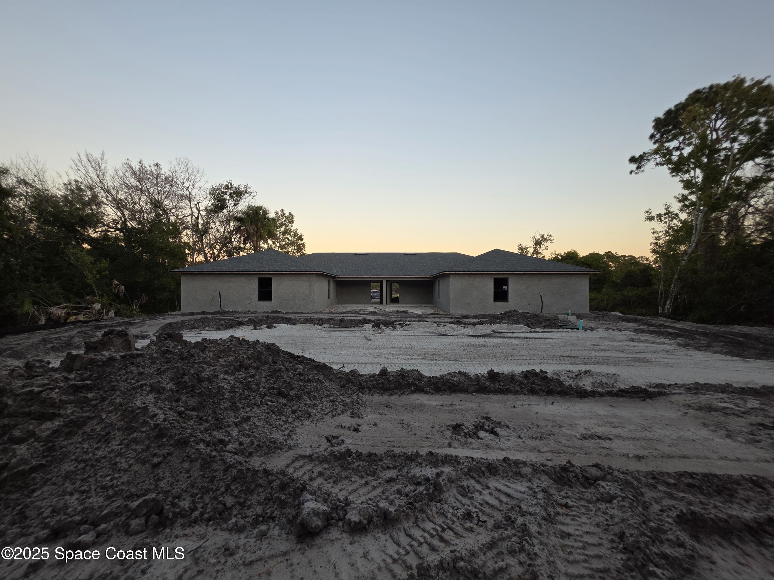 2542 Hester Avenue Southeast, Unit A Palm Bay, FL 32909 - Photo 5 of 9 a view of a yard