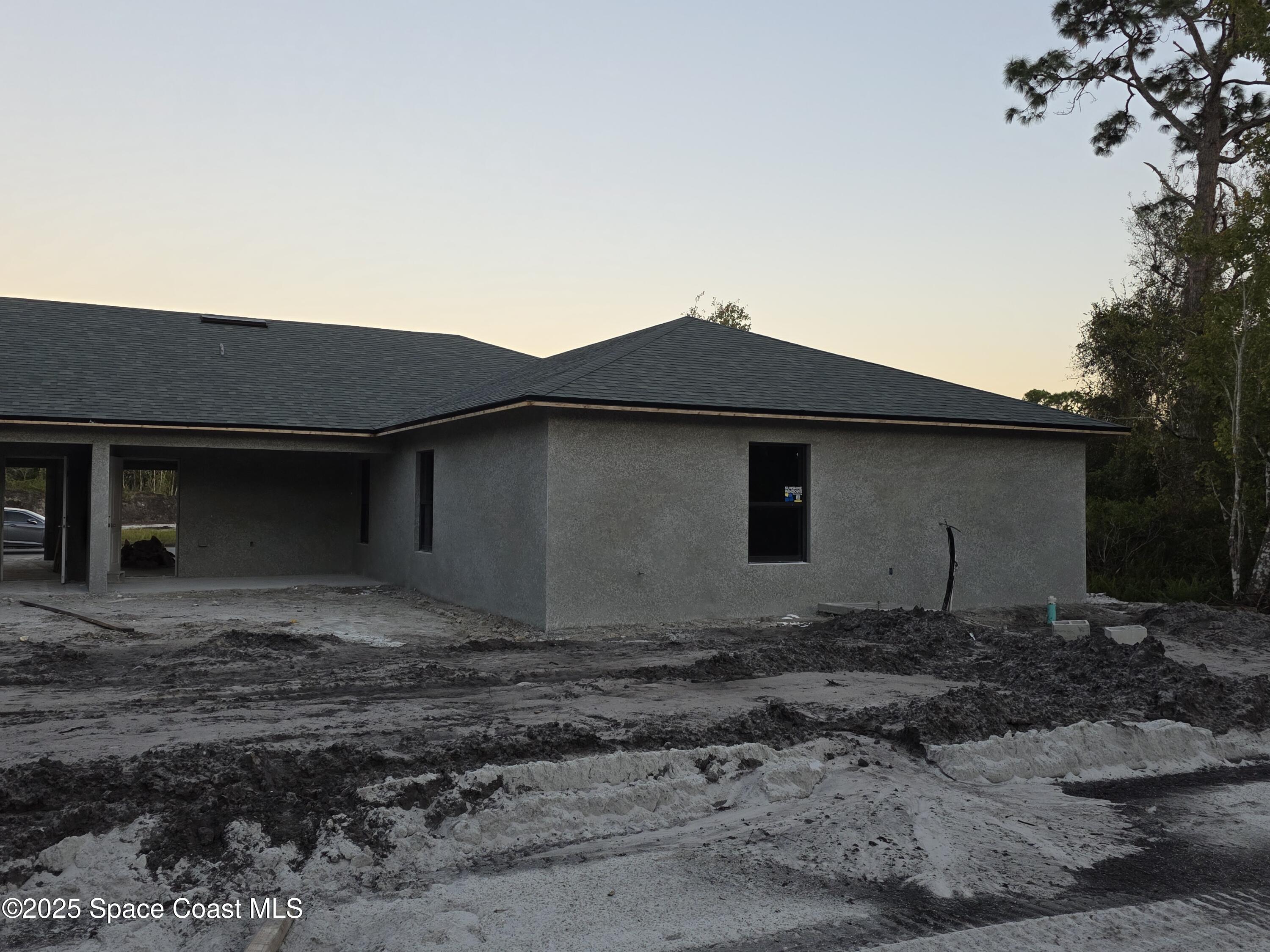 2542 Hester Avenue Southeast, Unit A Palm Bay, FL 32909 - Photo 8 of 9 a house view with a backyard space