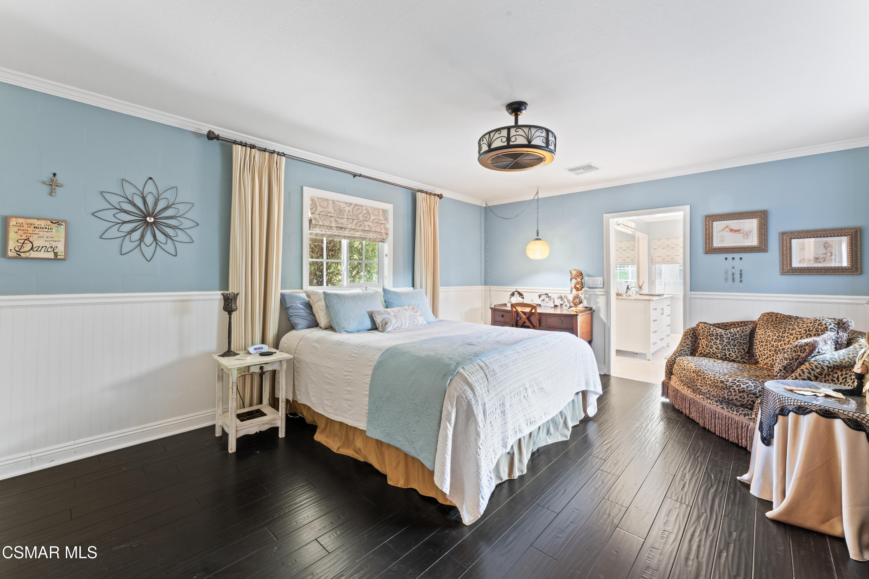 636 Sinaloa Road Simi Valley, CA 93065 - Photo 11 of 31 a bedroom with a bed and wooden floor