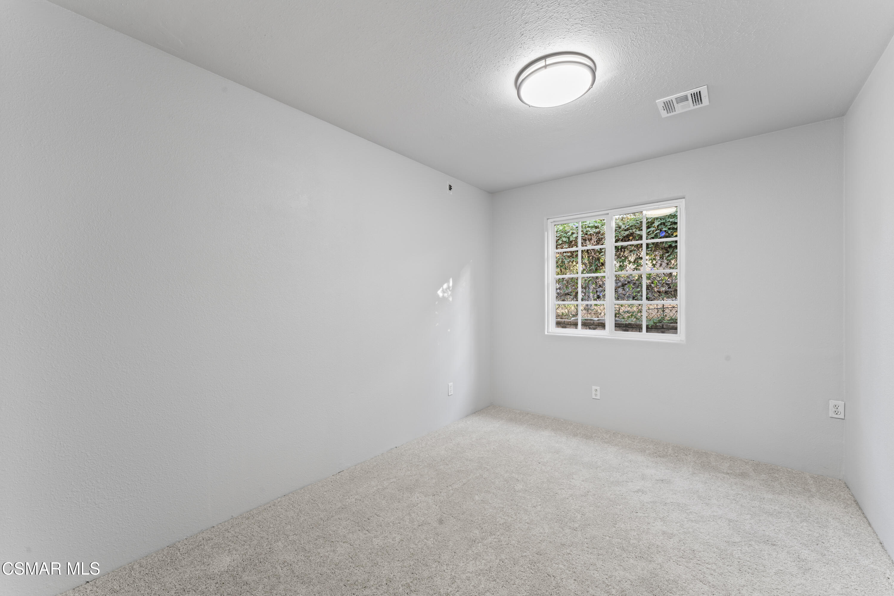 636 Sinaloa Road Simi Valley, CA 93065 - Photo 18 of 31 an empty room with a window