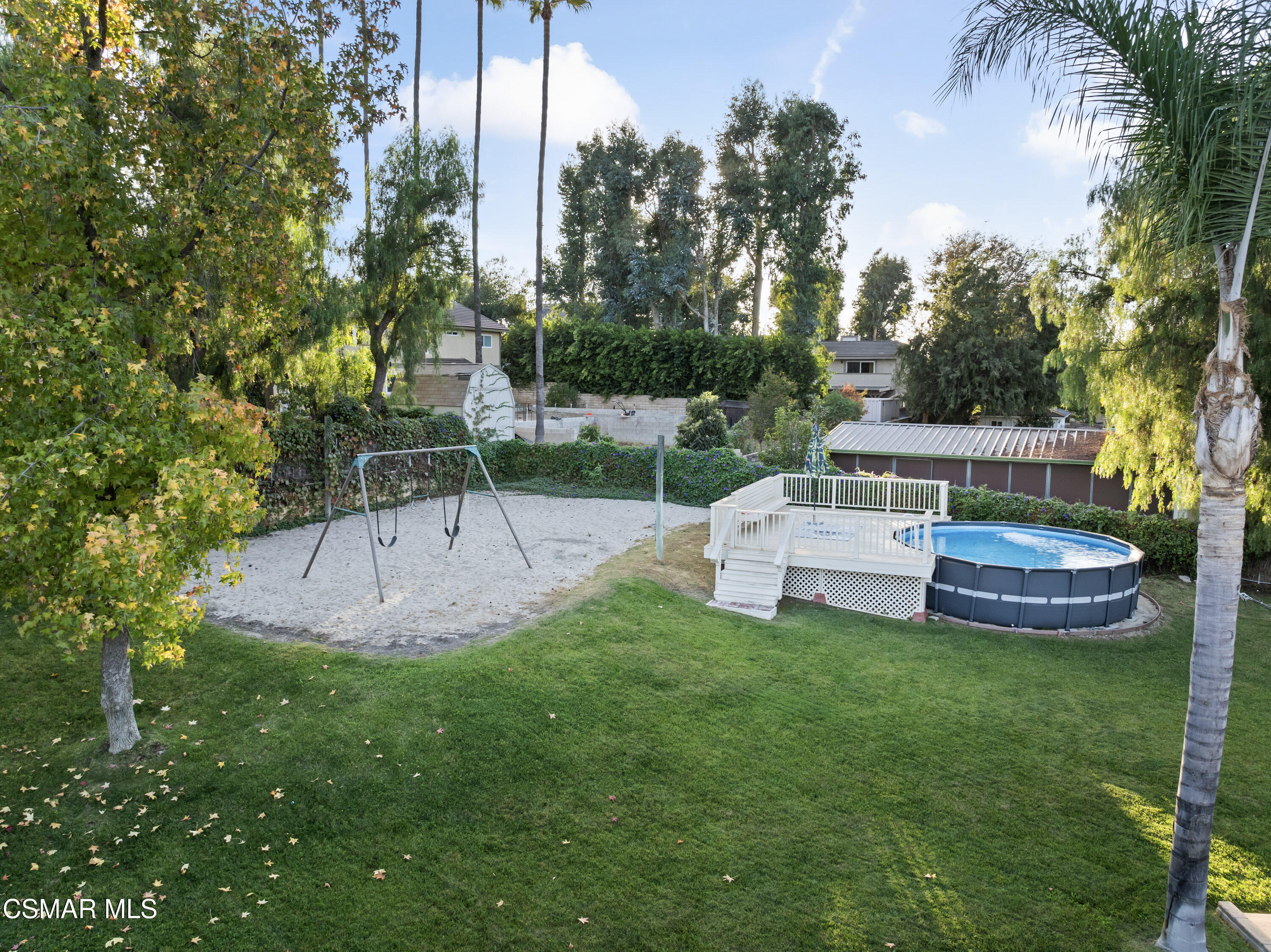 636 Sinaloa Road Simi Valley, CA 93065 - Photo 25 of 31 a view of a swimming pool with a garden