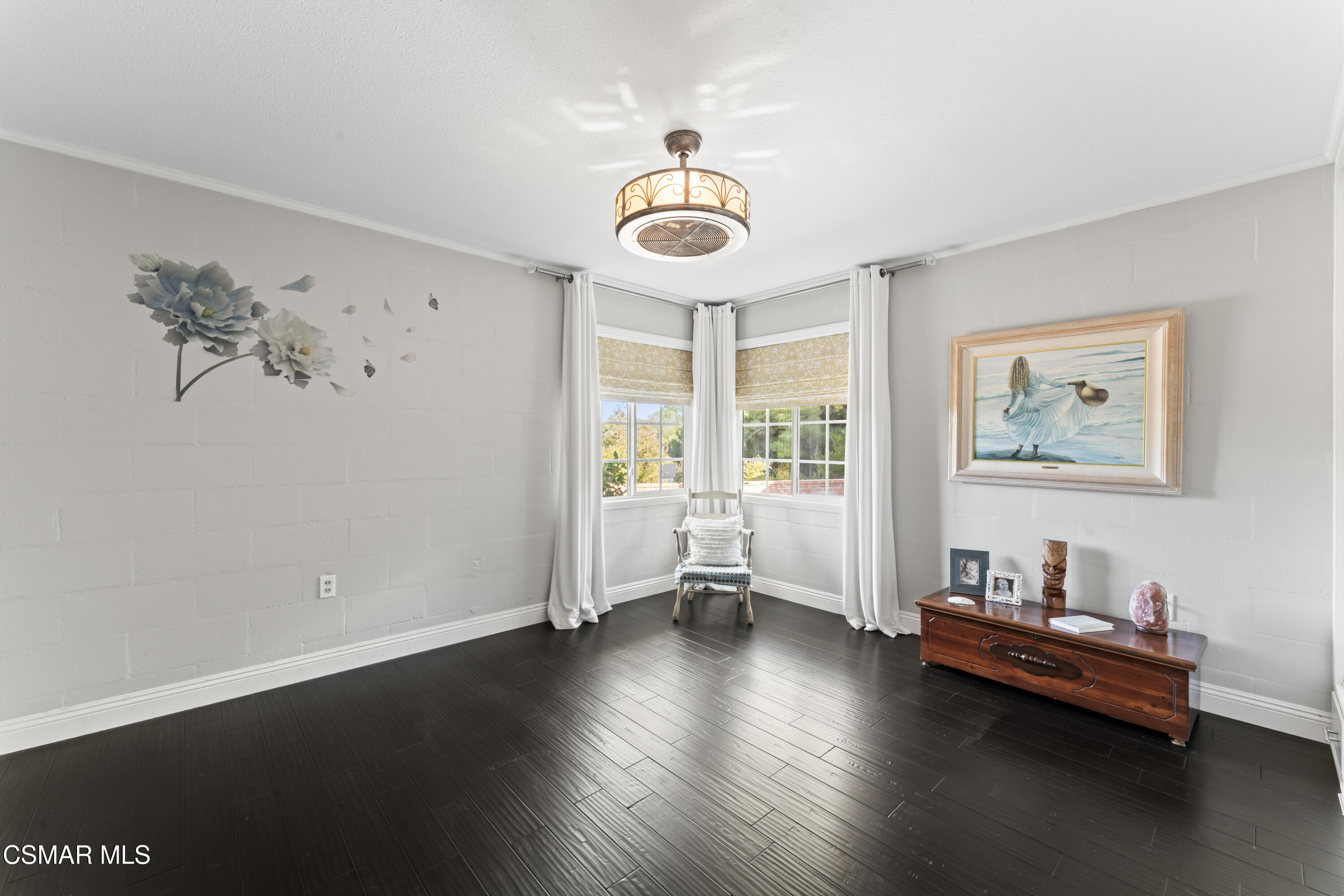 636 Sinaloa Road Simi Valley, CA 93065 - Photo 9 of 31 a view of a livingroom with furniture wooden floor and window