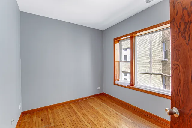 a view of a room with a large window