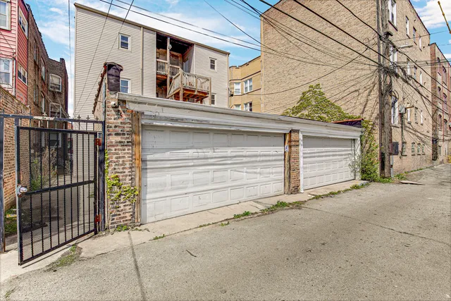 a view of a house with a street