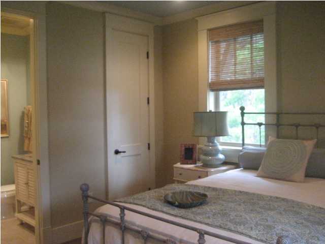 38 Grande Pointe Circle Inlet Beach, FL 32461 - Photo 24 of 30 a bedroom with a bed and window
