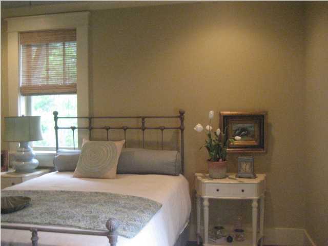 38 Grande Pointe Circle Inlet Beach, FL 32461 - Photo 25 of 30 a bedroom with a bed and a table
