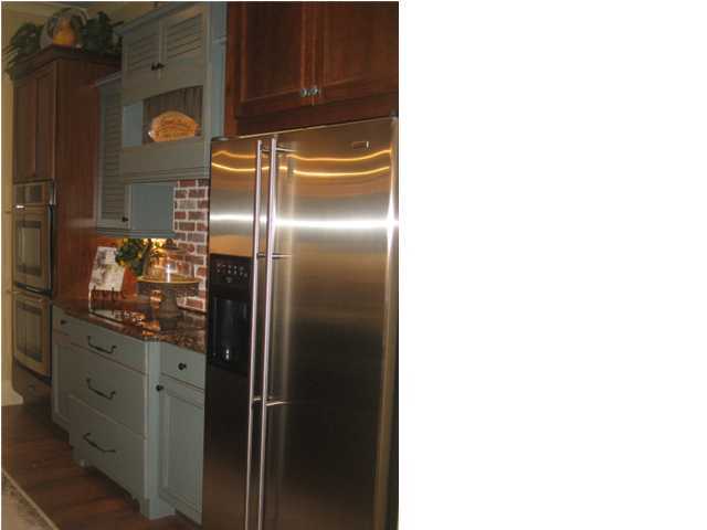 38 Grande Pointe Circle Inlet Beach, FL 32461 - Photo 6 of 30 a metallic refrigerator freezer sitting inside of a kitchen