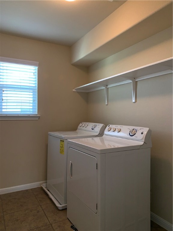 151 Chickadee Cove Kyle, TX 78640 - Photo 20 of 29 a utility room with dryer and washer