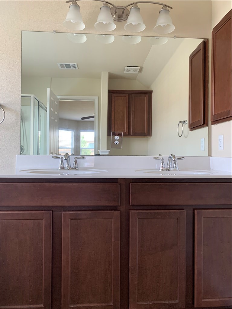 151 Chickadee Cove Kyle, TX 78640 - Photo 9 of 29 Primary bathroom Double Vanity