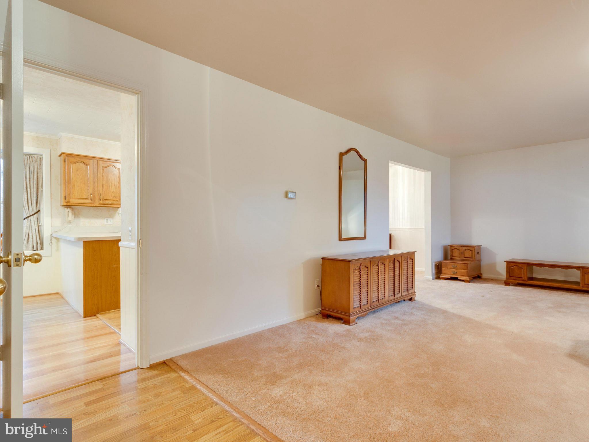8613 Victoria Road Springfield, VA 22151 - Photo 7 of 21 a view of a livingroom with a furniture