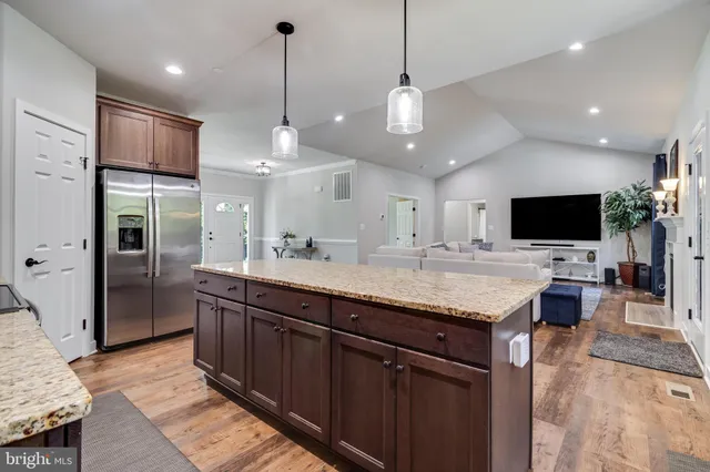 a bathroom with a toilet a sink and a mirror