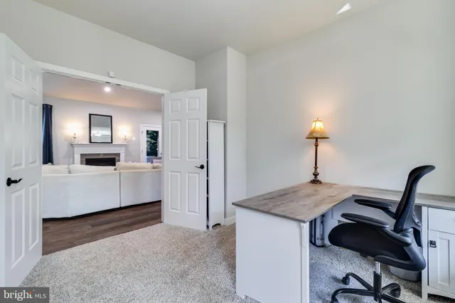 a bathroom with a sink vanity and mirror
