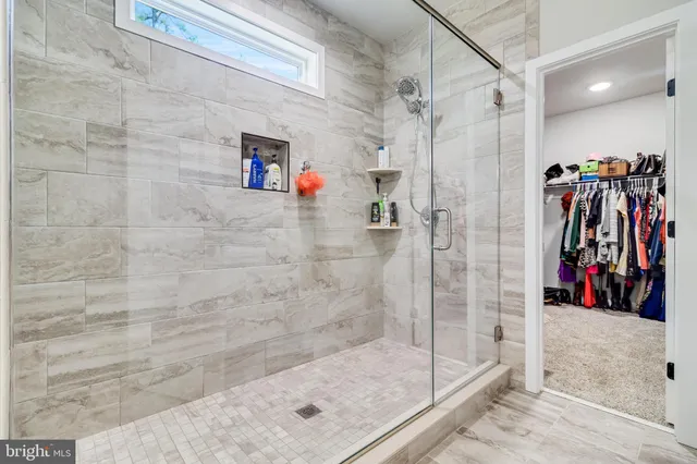 a bedroom with a bed and a closet