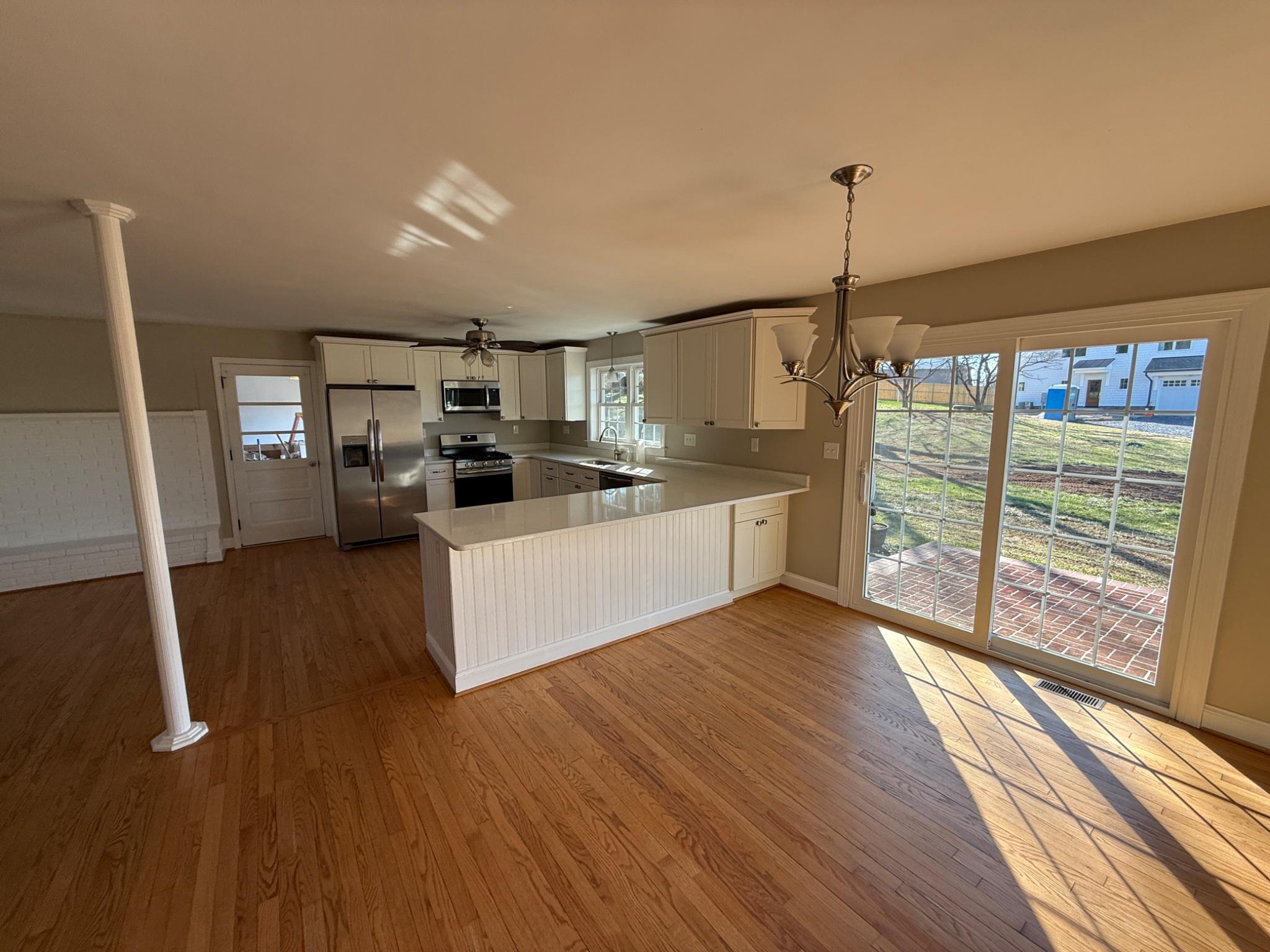 3235 Old Liberty Road New Windsor, MD 21776 - Photo 5 of 21 Dining room, kitchen space w/ slider to the patio.