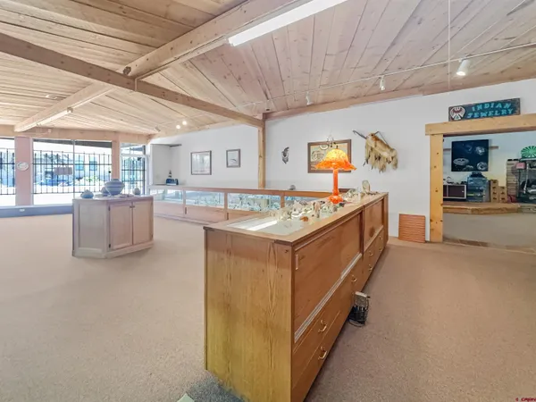 a kitchen with a stove and a refrigerator