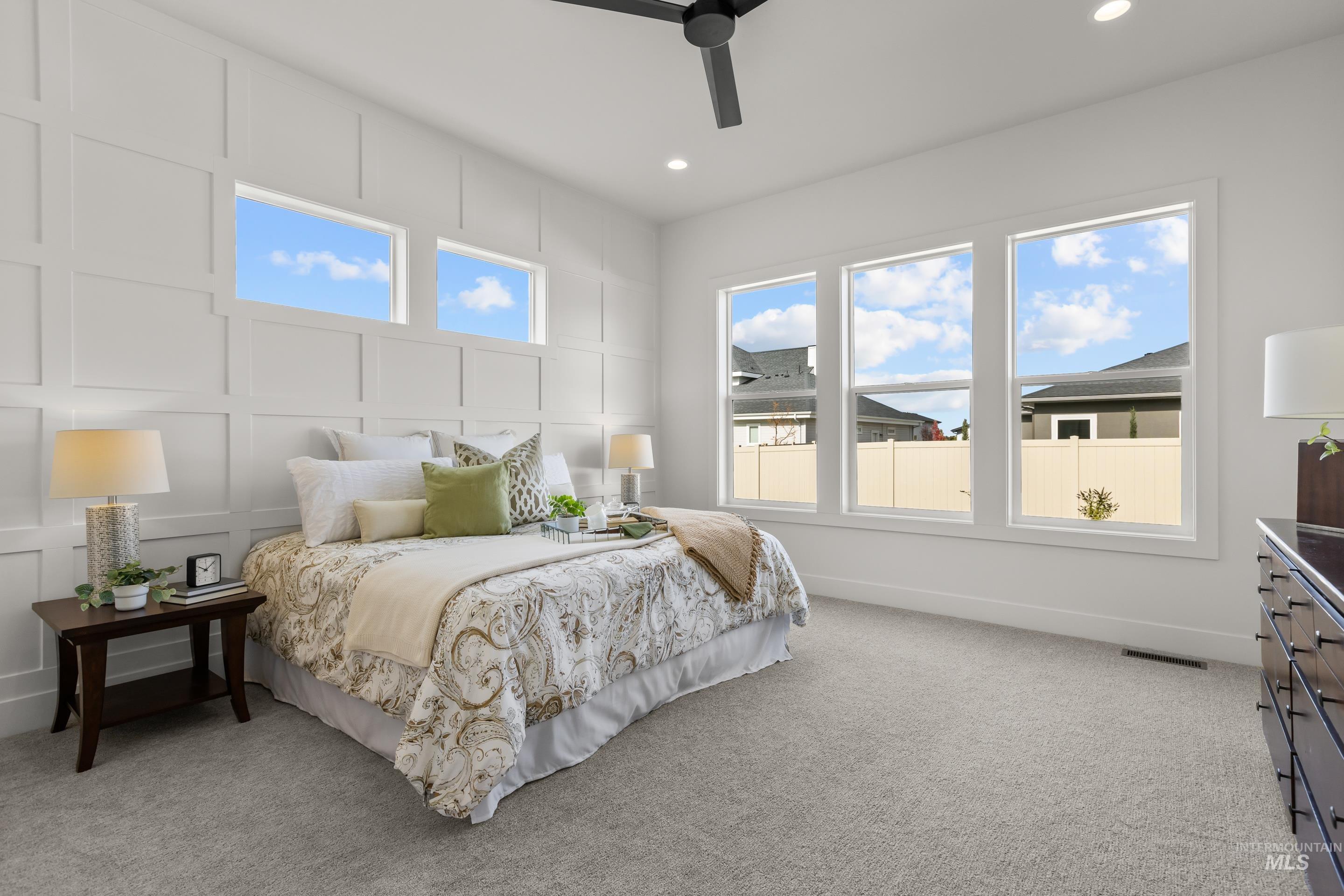 13 Blk 7 E Strut Way Boise, ID 83716 - Photo 25 of 50 Bedroom featuring a decorative wall, a ceiling fan, light carpet, and recessed lighting