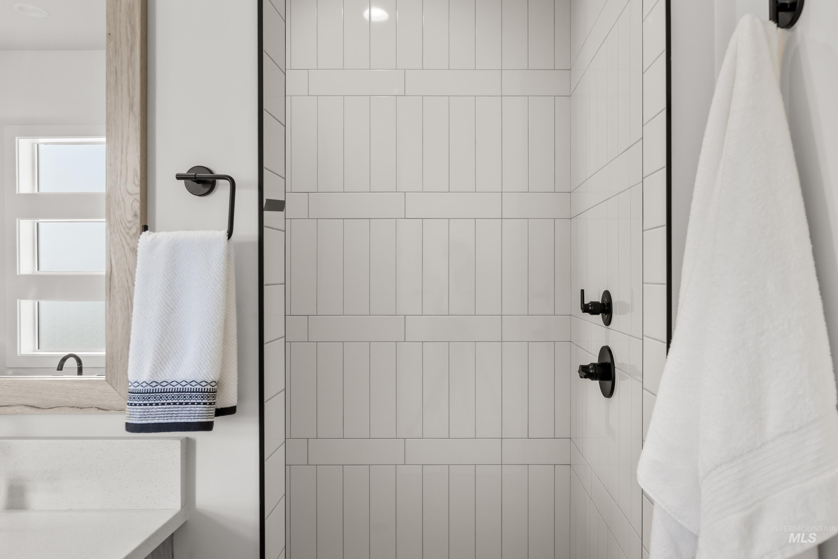 13 Blk 7 E Strut Way Boise, ID 83716 - Photo 33 of 50 Bathroom with tiled shower