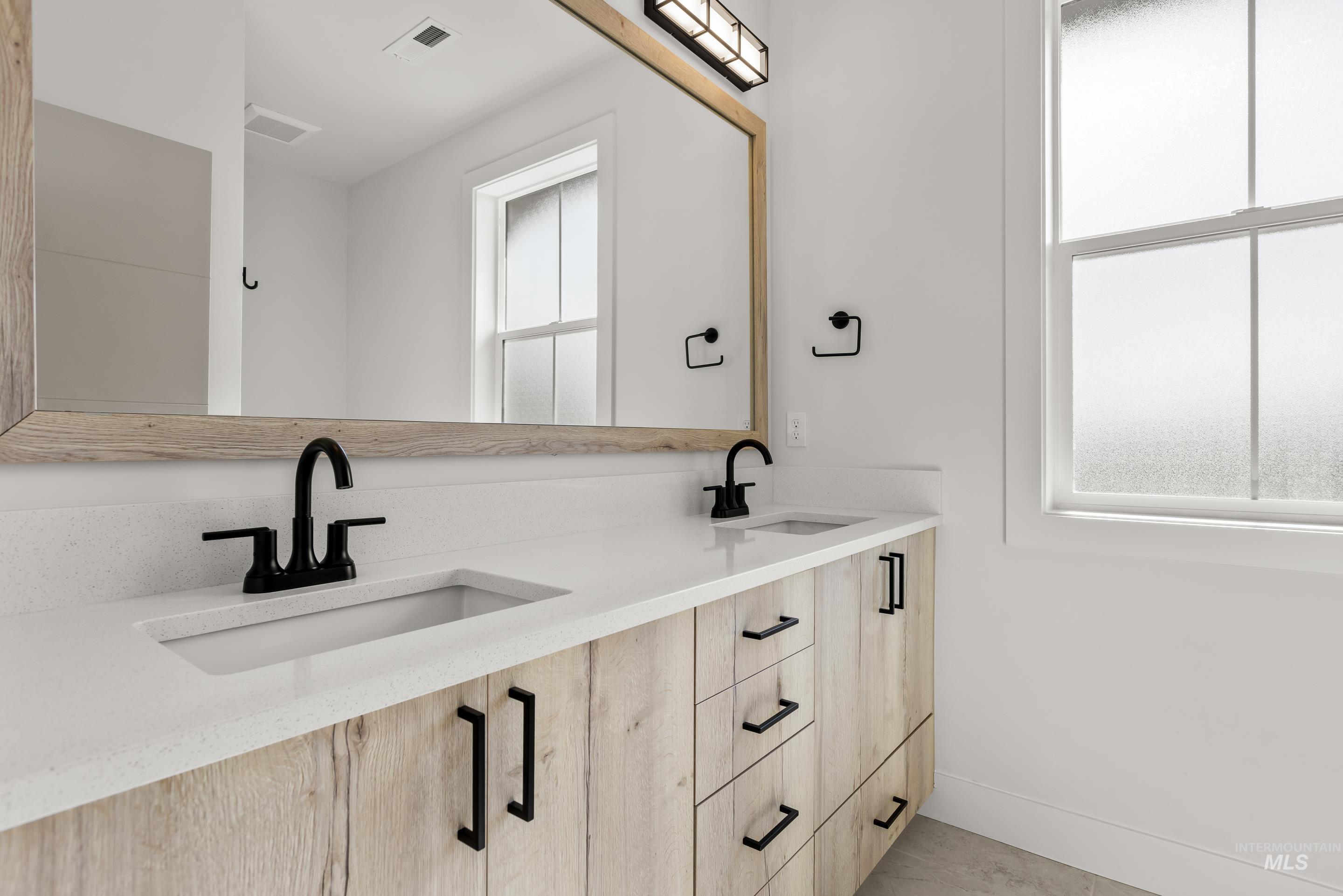 13 Blk 7 E Strut Way Boise, ID 83716 - Photo 46 of 50 Full bathroom featuring double vanity