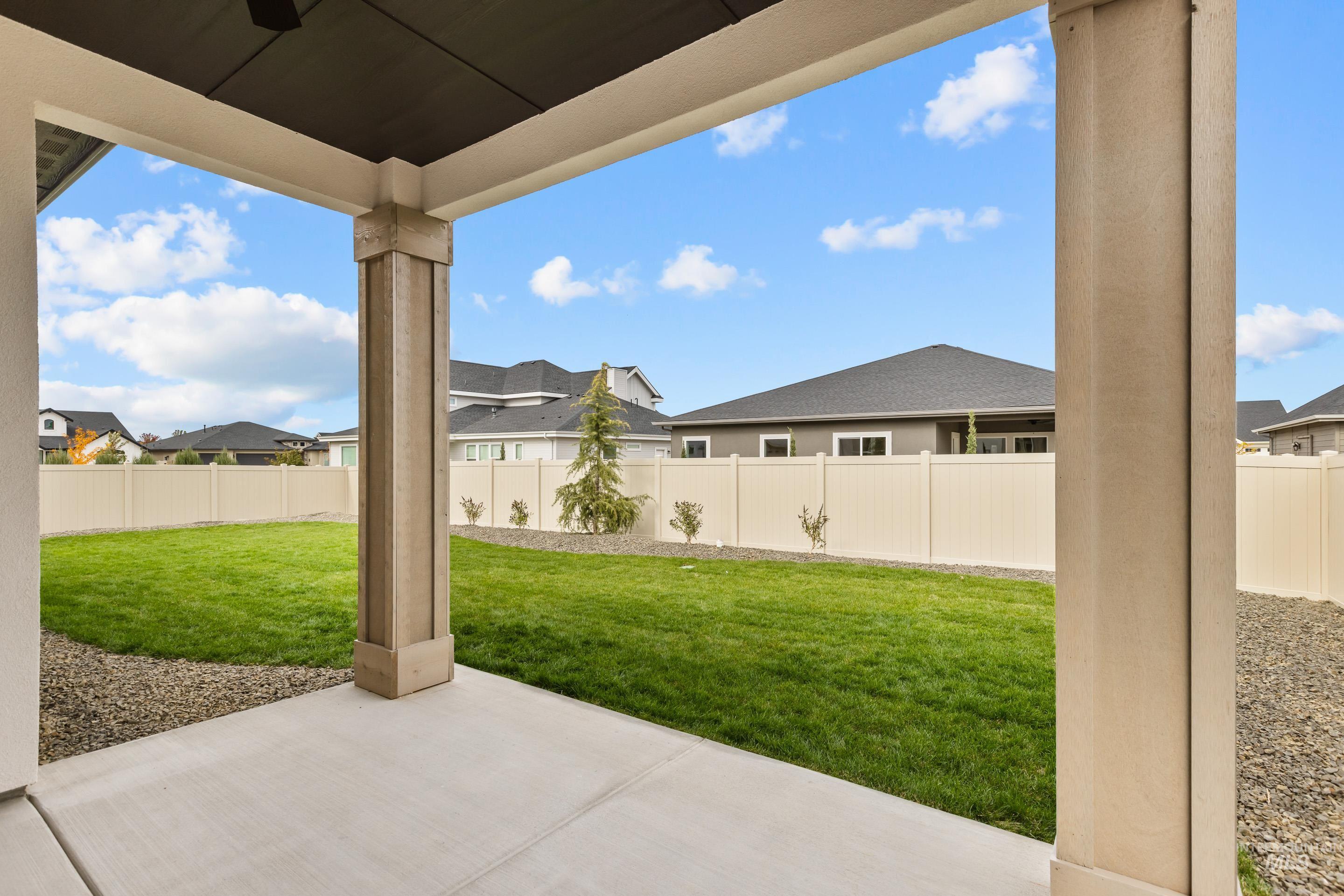 13 Blk 7 E Strut Way Boise, ID 83716 - Photo 49 of 50 Fenced backyard with a patio and a residential view
