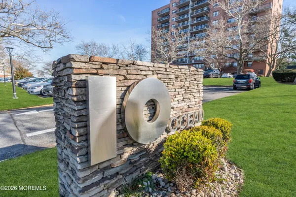 a aerial view of a house with garden and trees