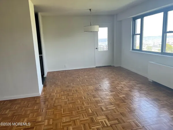 a view of an empty room and window
